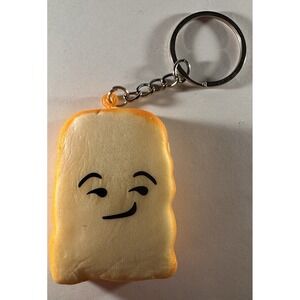 Cute Slice of toast keychain featuring playful smug facial expression